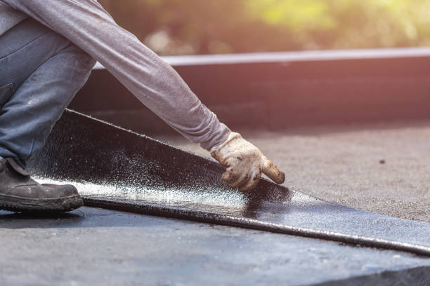 Professional Basement Waterproofing technician working in Manchester, WA